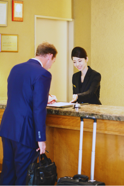 Hospitality workforce screening workflow illustration for hotel and guest-facing teams.